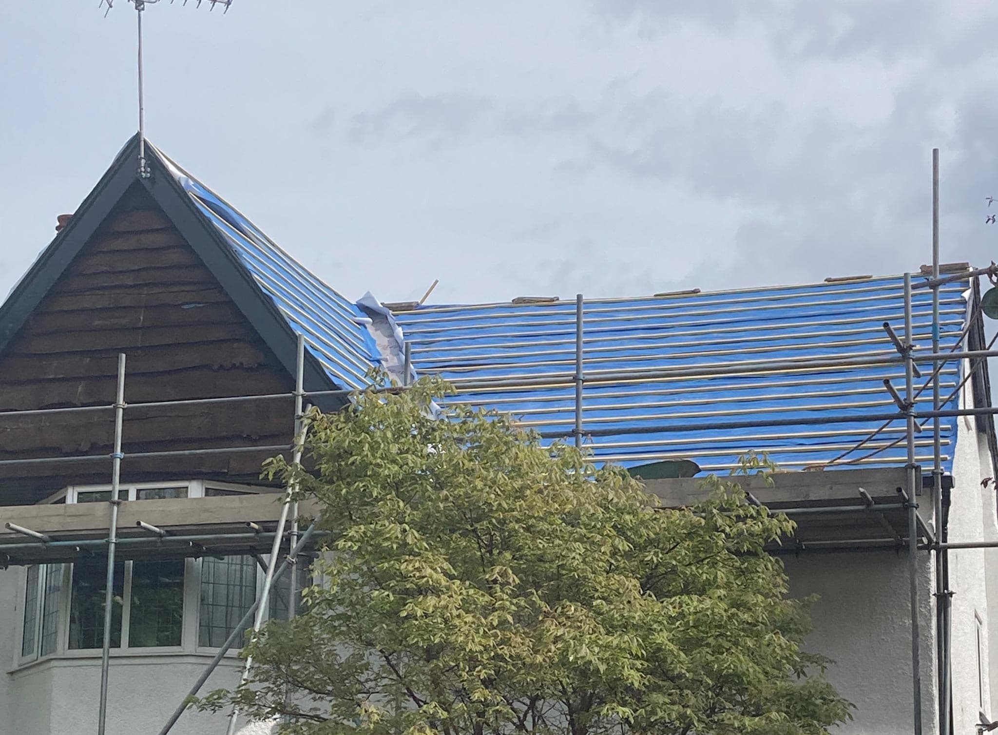 Re-roofing in progress by APM Roofing